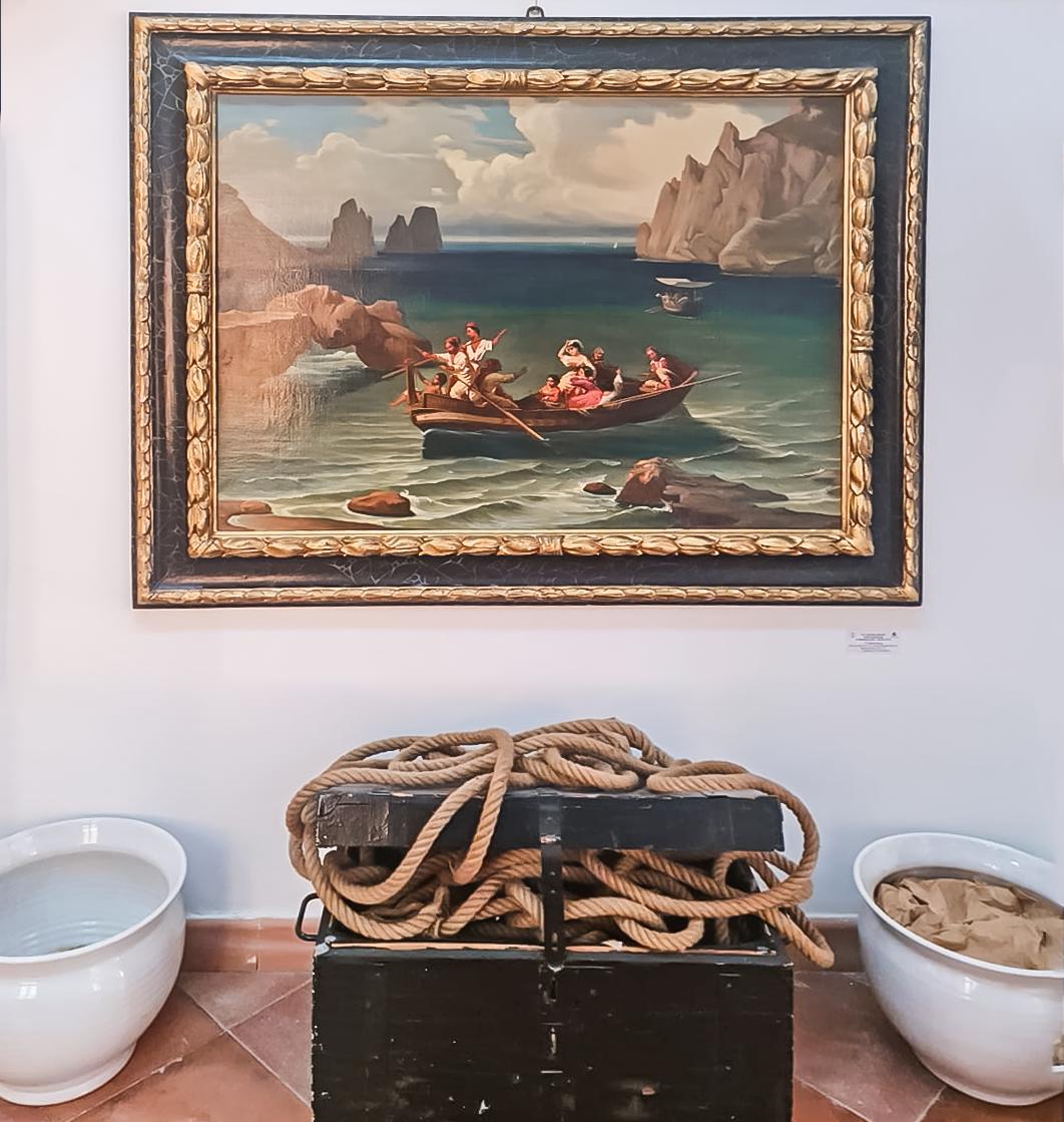 framed painting of people on a boat in capri