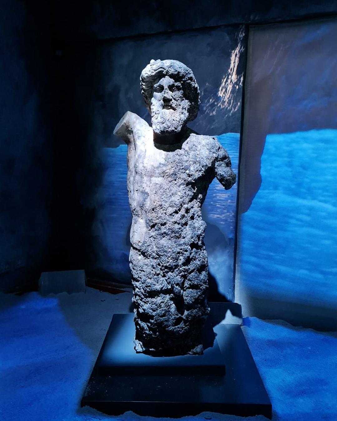 poseidon statue found in the blue grotto capri